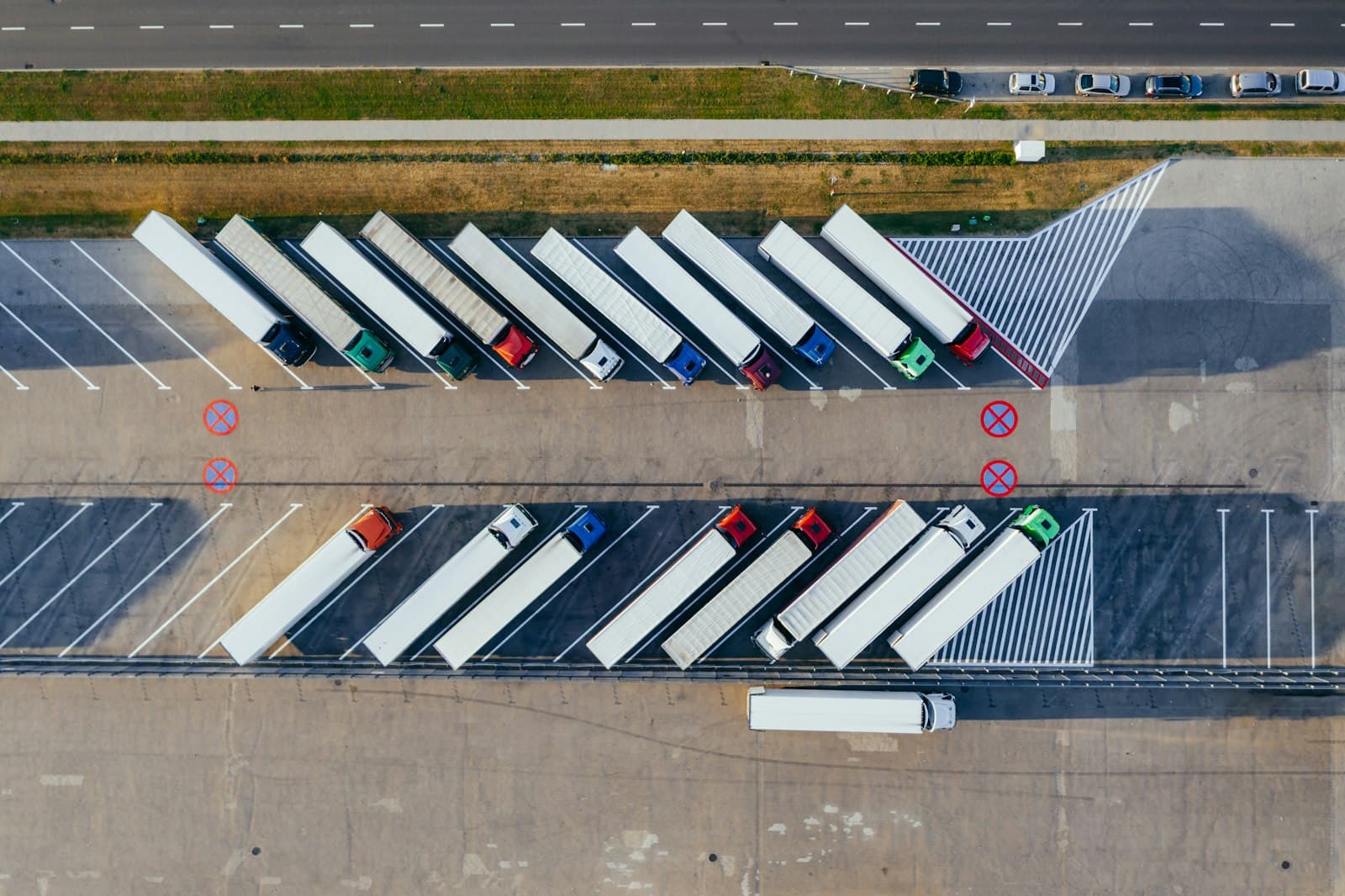 Aerial view of a truck fleet parked in rows